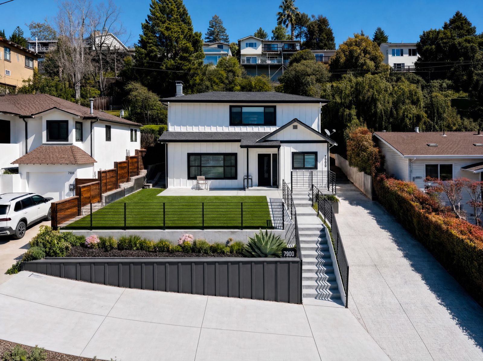 After: finished modern white home at 7900